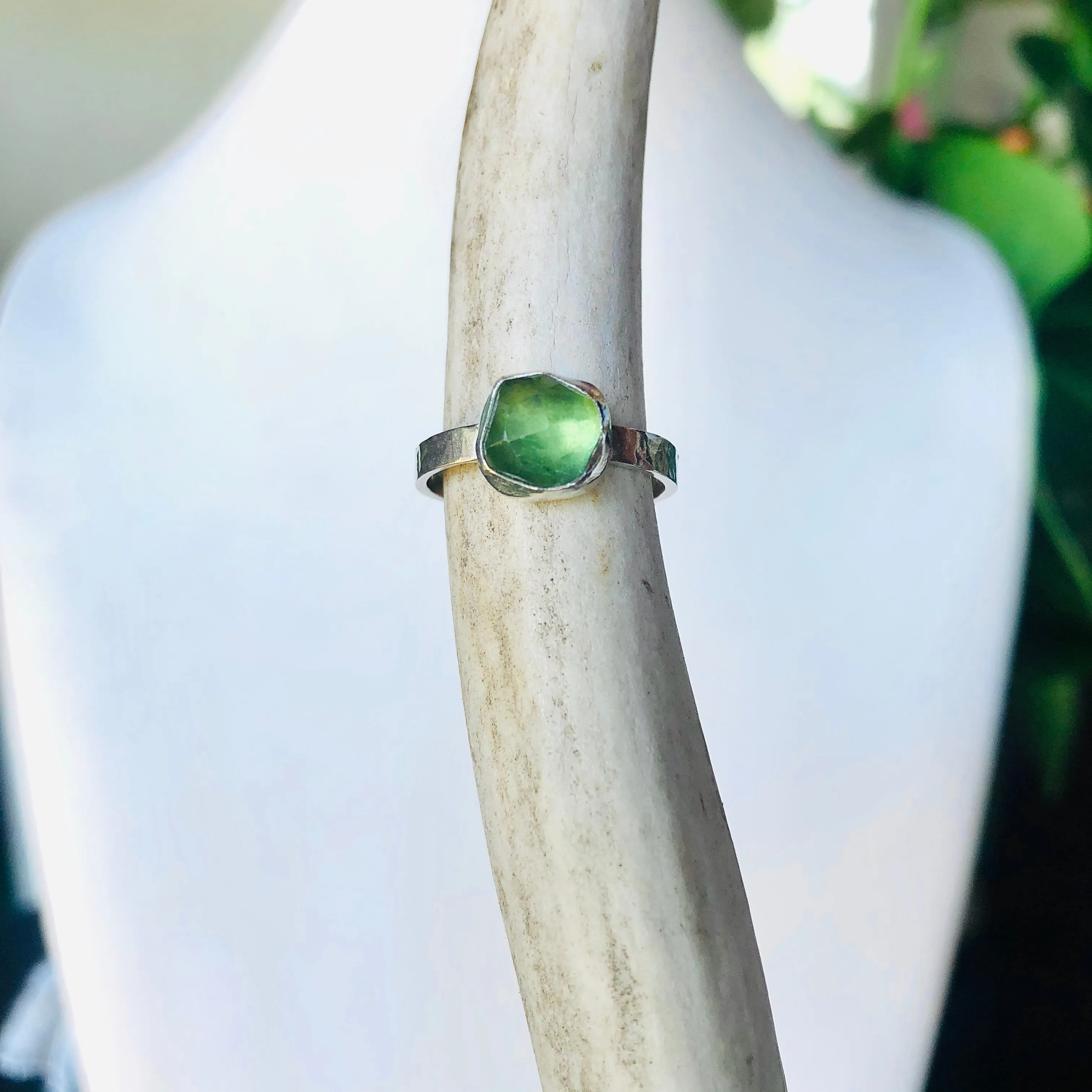 glowing green tourmaline ring