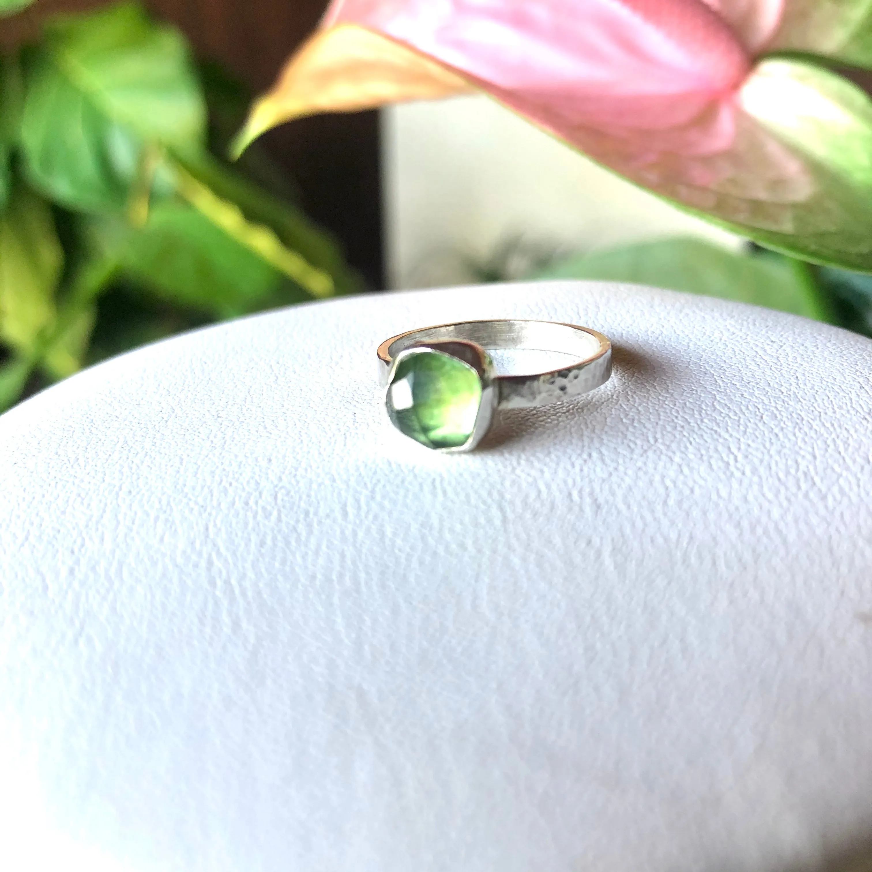 glowing green tourmaline ring