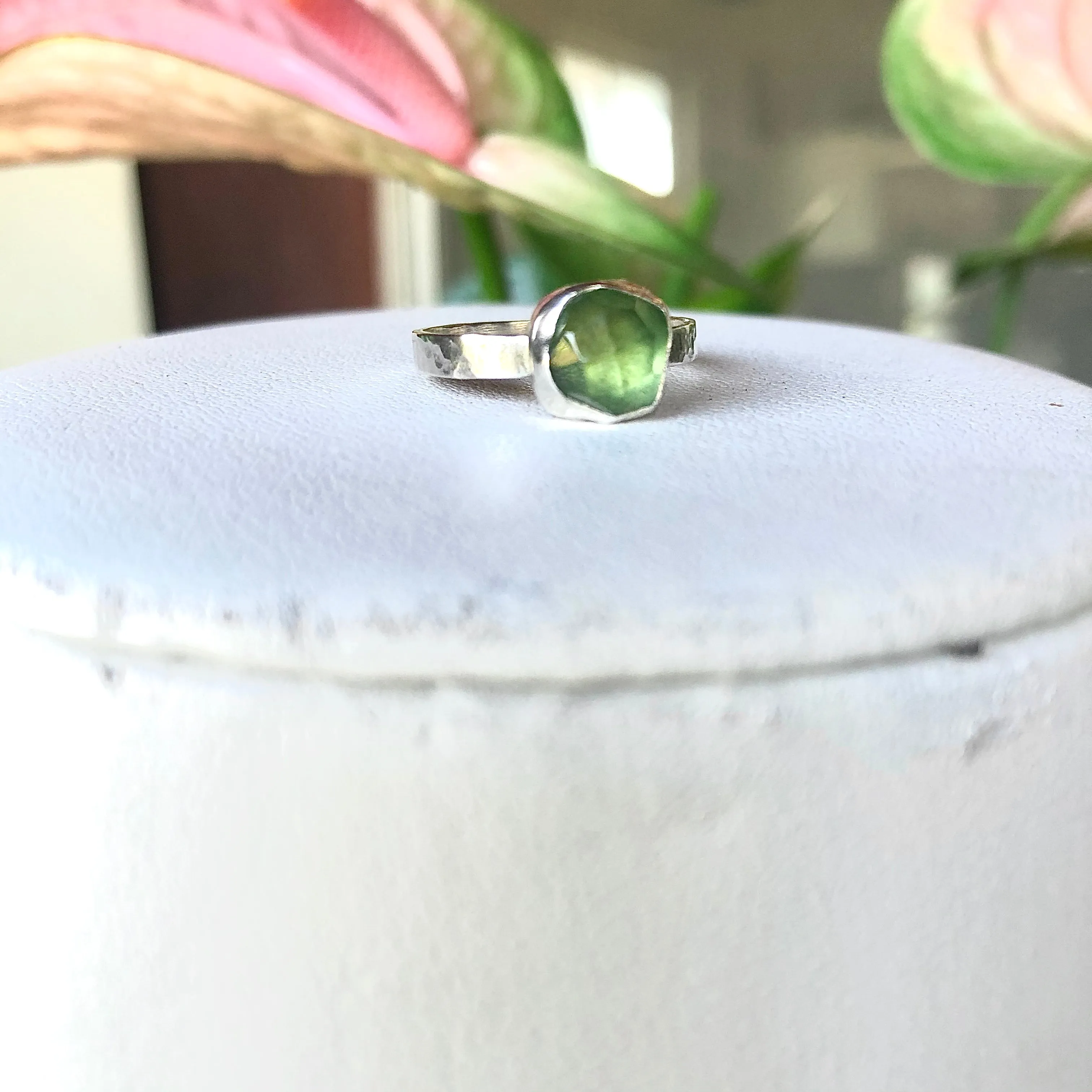 glowing green tourmaline ring