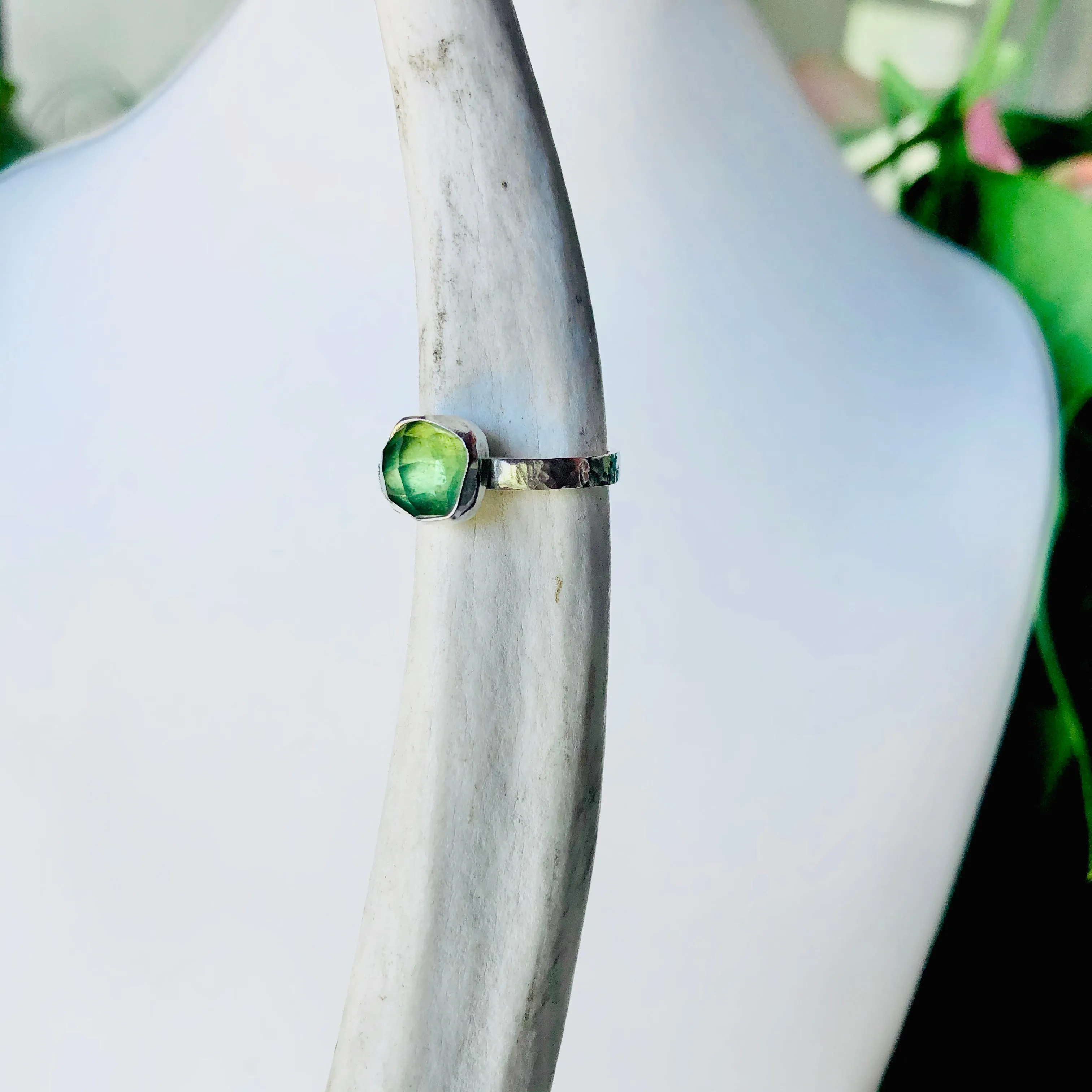 glowing green tourmaline ring